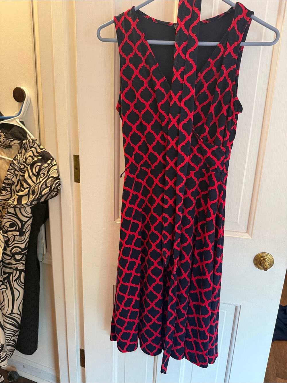 Sleeveless Black Dress with Red Lattice Print